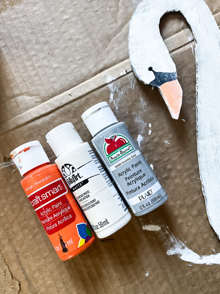 hunting for vintage swan decor and having a hard time finding it on a budget? No worries - make your own with this quick and easy cardboard project! I provide the pattern for a large swan decor piece and you do the simple work of cutting and painting! Make your vintage summer vignettes complete with this beautiful high-end craft project! #cardboarddecor #swandecor #vintagesummer