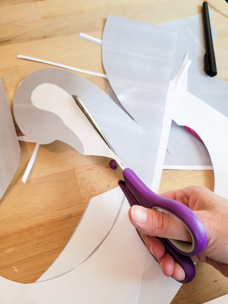 hunting for vintage swan decor and having a hard time finding it on a budget? No worries - make your own with this quick and easy cardboard project! I provide the pattern for a large swan decor piece and you do the simple work of cutting and painting! Make your vintage summer vignettes complete with this beautiful high-end craft project! #cardboarddecor #swandecor #vintagesummer