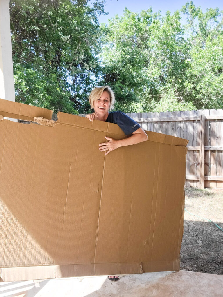 Make a life-size life preserver for vintage summer decorating. This large cardboard project will add a vintage vibe to your beach house, summer vignette or nautical decor motif. So easy and super budget-friendly. #budgetsummerdecor #beachtheme #vintagestylesummer