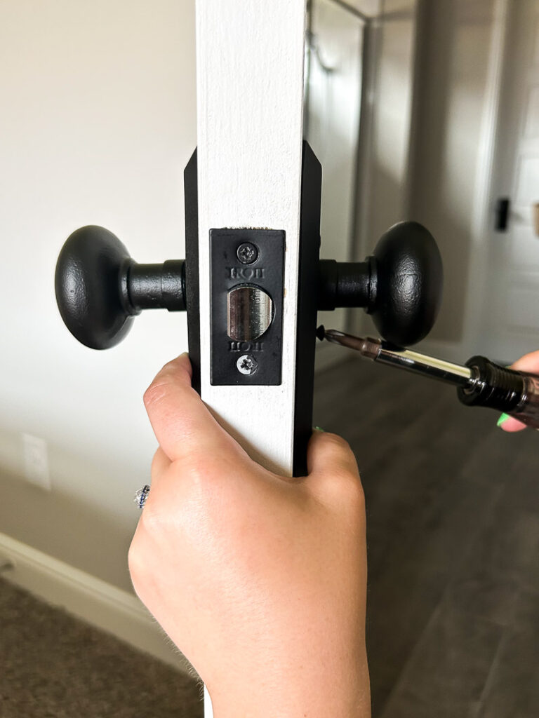 Here's how to replace your door hardware like a Pro, and upgrade your space in a big way (it only takes a few minutes)!! #doorhardware #easyhomeupdate #doorknob #agelessiron