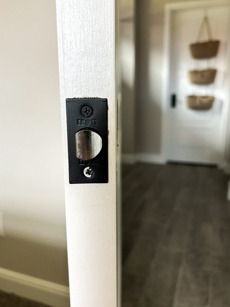 Here's how to replace your door hardware like a Pro, and upgrade your space in a big way (it only takes a few minutes)!! #doorhardware #easyhomeupdate #doorknob #agelessiron