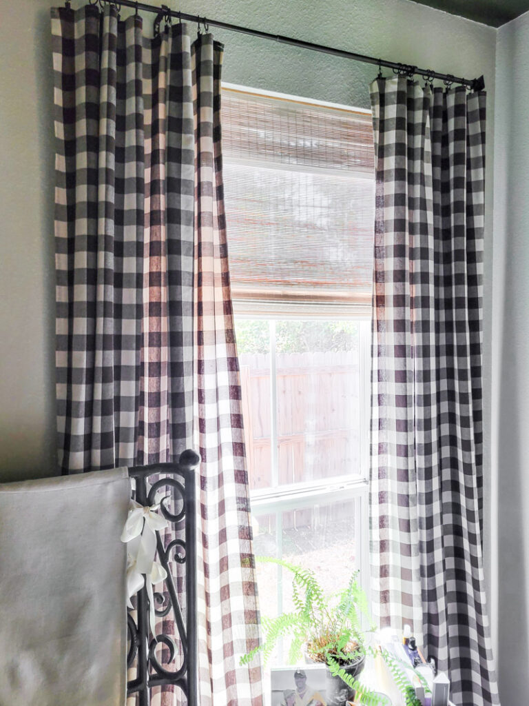 Master bedroom redo. Vintage paint color palette and budget curtain hack, get the look for less from Ballard Design. Buffalo check curtains make big impact for cheap. #greenbedroom #vintagebedroom #taxidermy #affordablecurtains