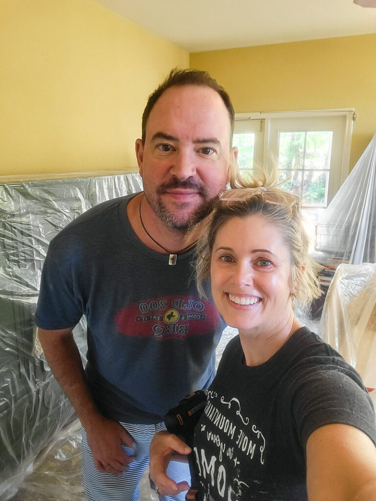 Master bedroom redo. Vintage paint color palette and budget curtain hack, get the look for less from Ballard Design. Buffalo check curtains make big impact for cheap. #greenbedroom #vintagebedroom #taxidermy #affordablecurtains