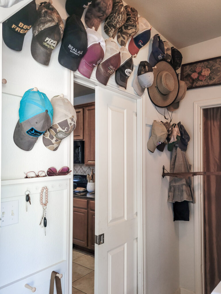 I'm a girl who loves vintage style... even when it comes to how to store baseball hats. If that's your vibe too, SEE THIS! #vintagestyle #hatstorage #baseballhat #baseballhatstorage