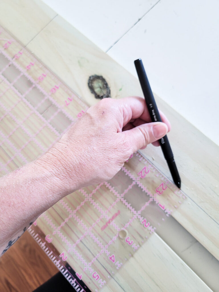 how to make DIY no-sew curtains for a farmhouse feel. This easy no sew curtain idea is perfect for decorating beginners and budget decorating enthusiasts! Drop cloth curtains are cheap and the perfect neutral curtain to accent a room. You can sew up this curtain tutorial but a little fabric glue will do the trick. If you are looking for the perfect white curtains or neutral curtain decor, this is the window valance idea for you! #DIYcurtain #budgetcurtain #nowsewwindowtreatment #nosewcurtain