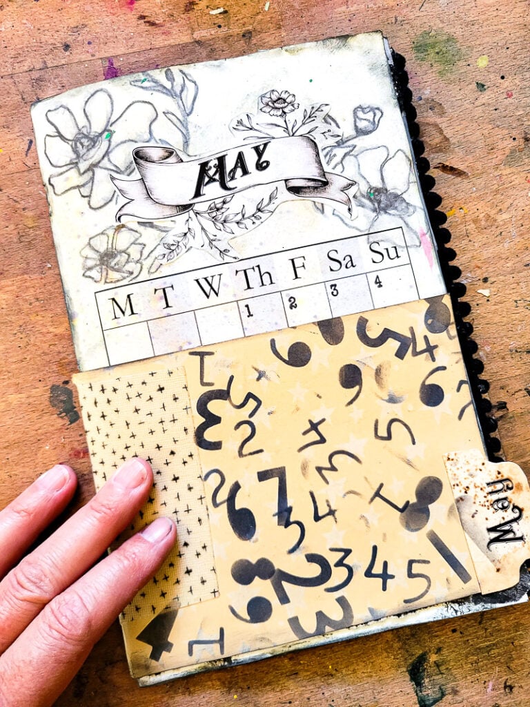 junk journal planner and calendar flip through, this month focuses on a black and white design aesthetic to calm the busy month of May down! #calendargirl #junkjournalcalendar #DIYplanner #DIYCalendar