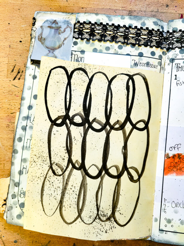 junk journal planner and calendar flip through, this month focuses on a black and white design aesthetic to calm the busy month of May down! #calendargirl #junkjournalcalendar #DIYplanner #DIYCalendar