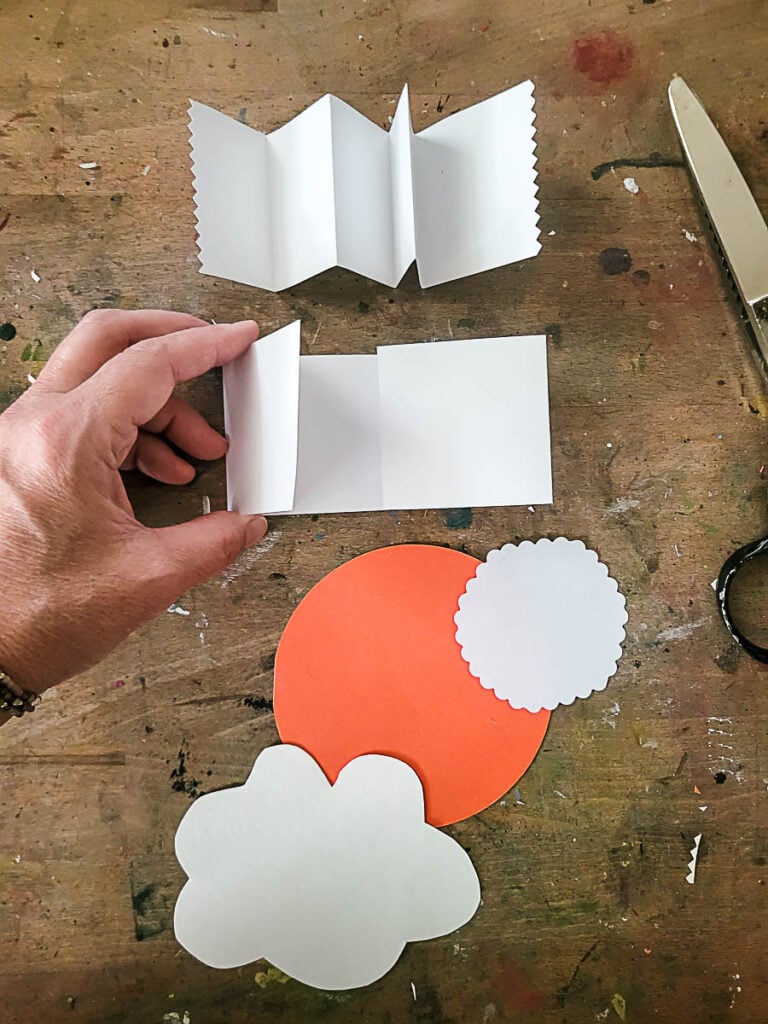 DIY journal tags made with vintage book pages, collage scraps, and layered embellishments. Creative ideas for junk journaling, Bible journaling, faith art journaling, and mixed media journal page decorations.