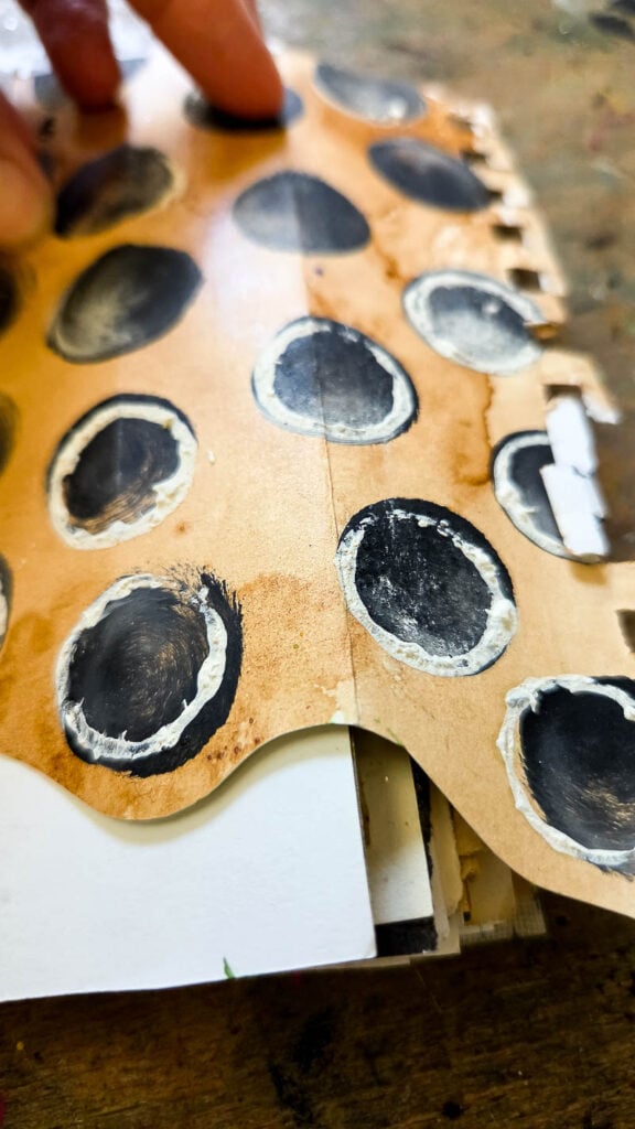 Use ordinary household items for mixed media art supplies